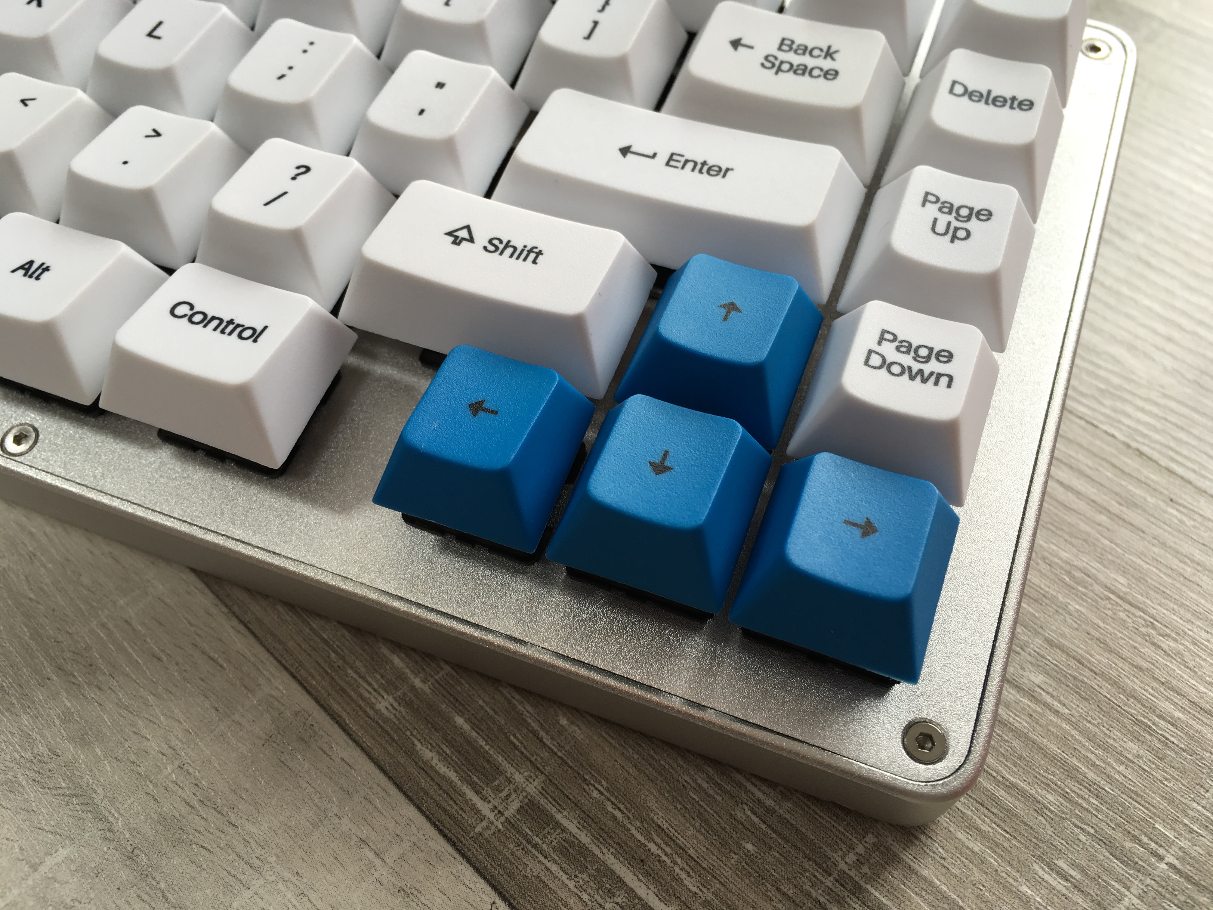 Closeup of the arrow keys on the Whitefox keyboard